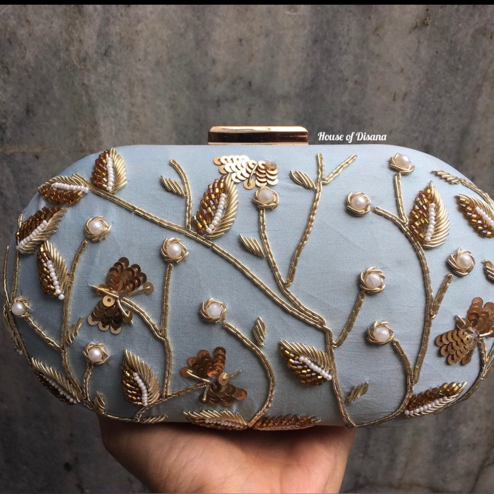 NWT Gorgeous Clutch Purse in Light Blue W/Golden Colored Pattern